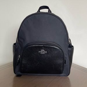 Genuine Coach black miniature backpack